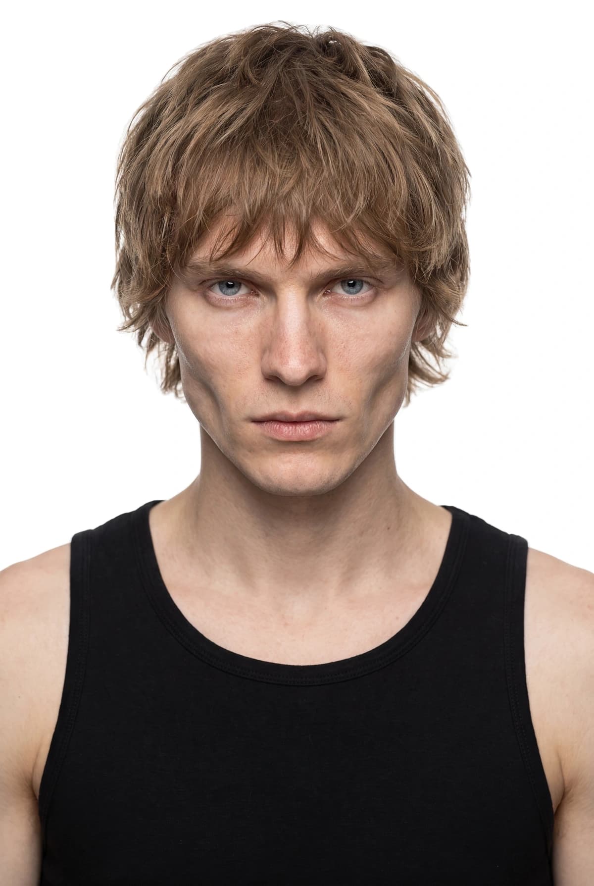 AI-generated male face with layered light brown hair for the 8M AI Faces catalogue roster