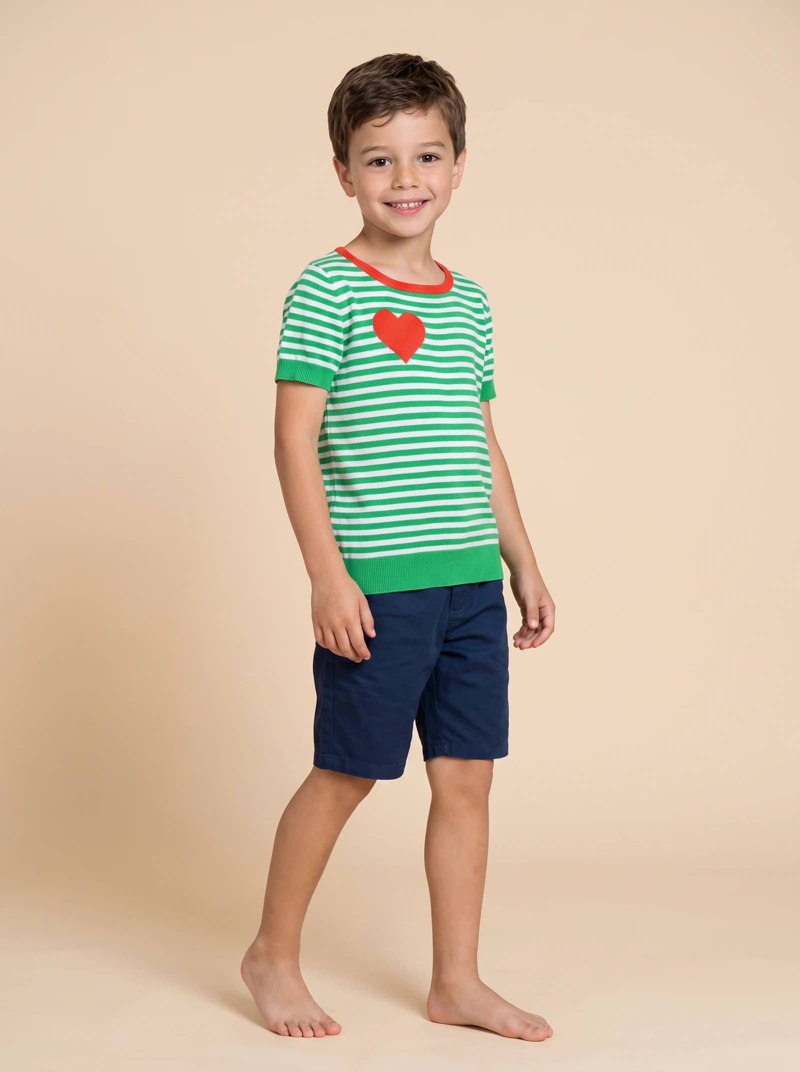Front full-body catalogue view of a child wearing the striped knit T-shirt