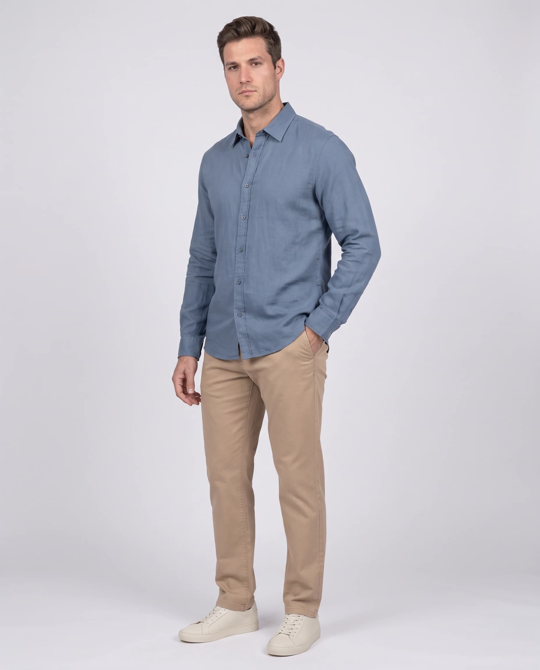 Front full-body menswear catalogue view wearing a blue shirt and khaki trousers